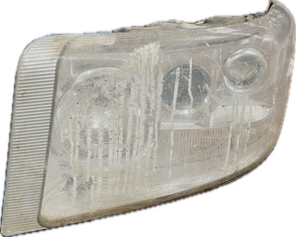 faro_izquierdo_7482588682_renault_trucks_renault_trucks_premium_2_distribution_370_26_2005_370cv_10800cc_1008584